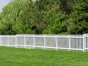 A Picture Of White Vinyl Fence That Looks Like Wrought Iron A Custom Install By Delco Fencing